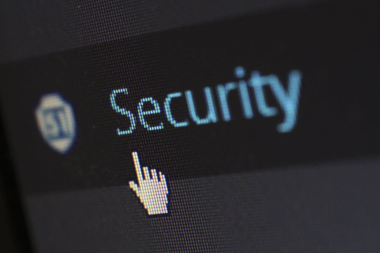 Close-up of a security prompt on a screen with a cursor selecting secure access, representing multi-factor authentication and account protection