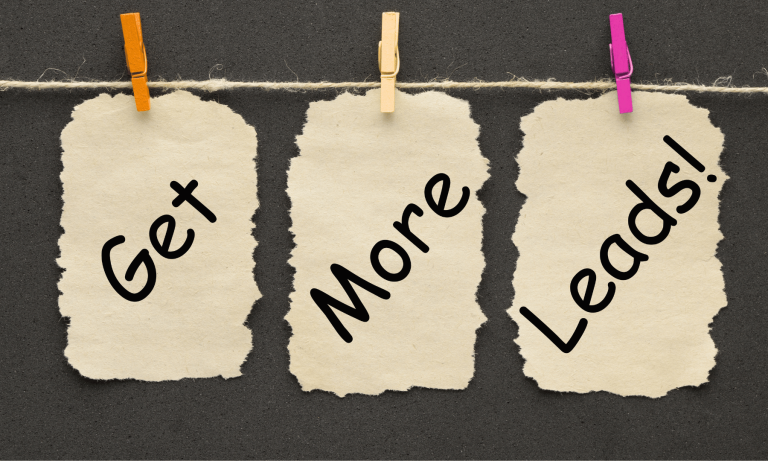 website costing you leads Paper notes reading get more leads, representing website problems that can cost a business leads and sales opportunities.