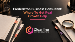Fredericton business consultant guide with proposal folders, a magnifying glass and Clearline Business Solutions logo